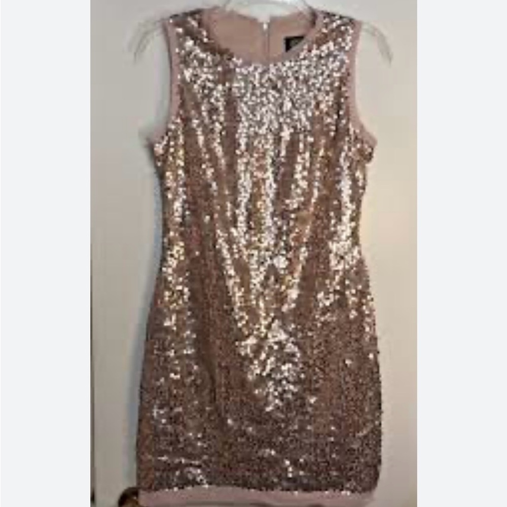 Vince Camuto Rose Gold Sequin Mini Dress
Stunning for any occasion. - Picture 14 of 14